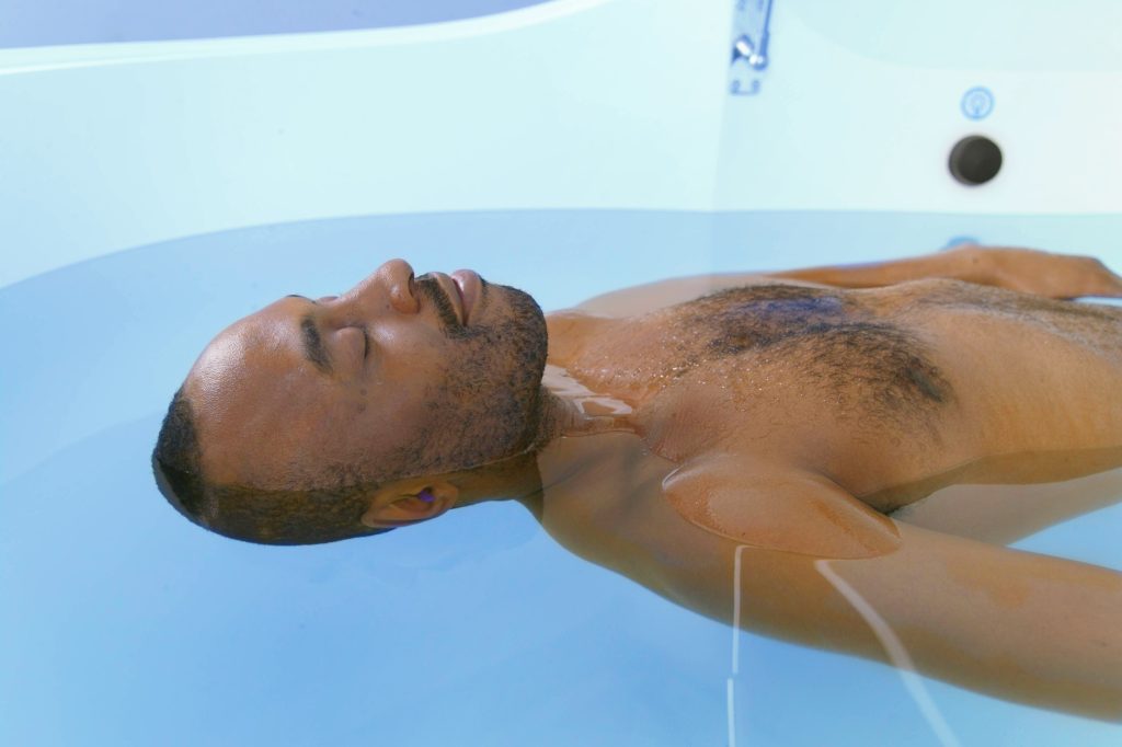 man in float tank